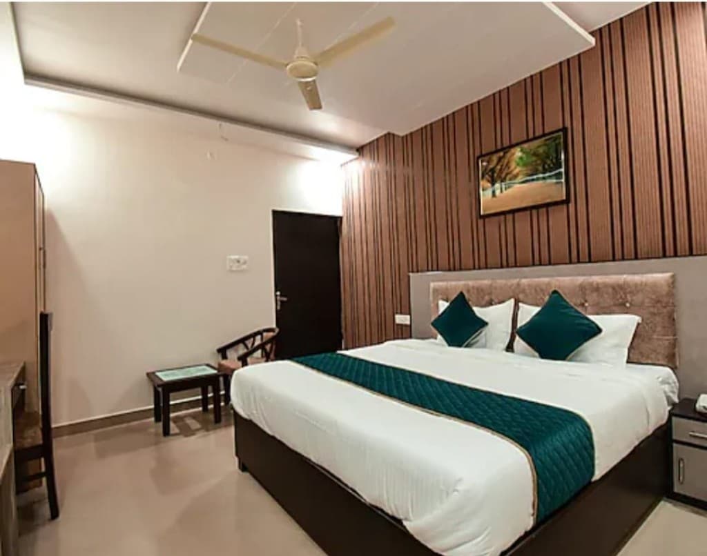 Executive Suite wardrobe, executive desk, chair, and designer false ceiling